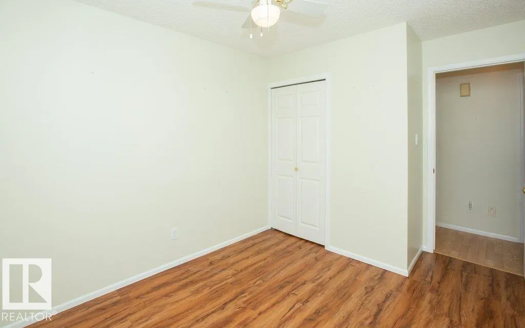 11015 105 St
