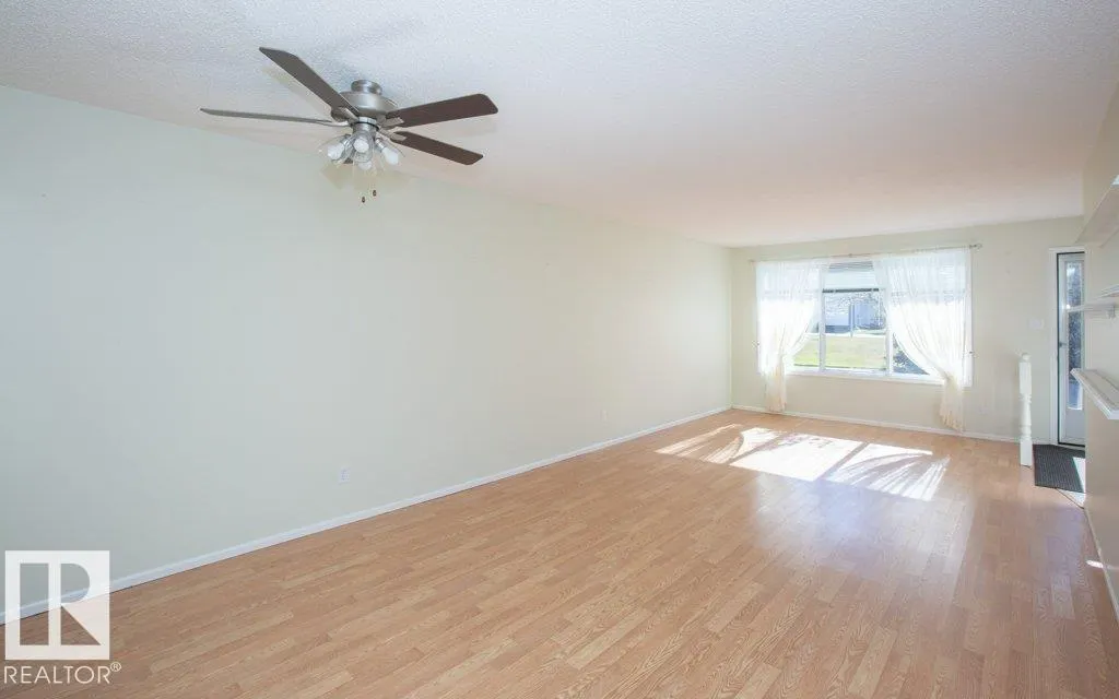 11015 105 St