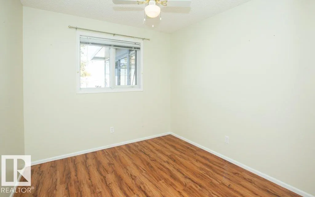 11015 105 St