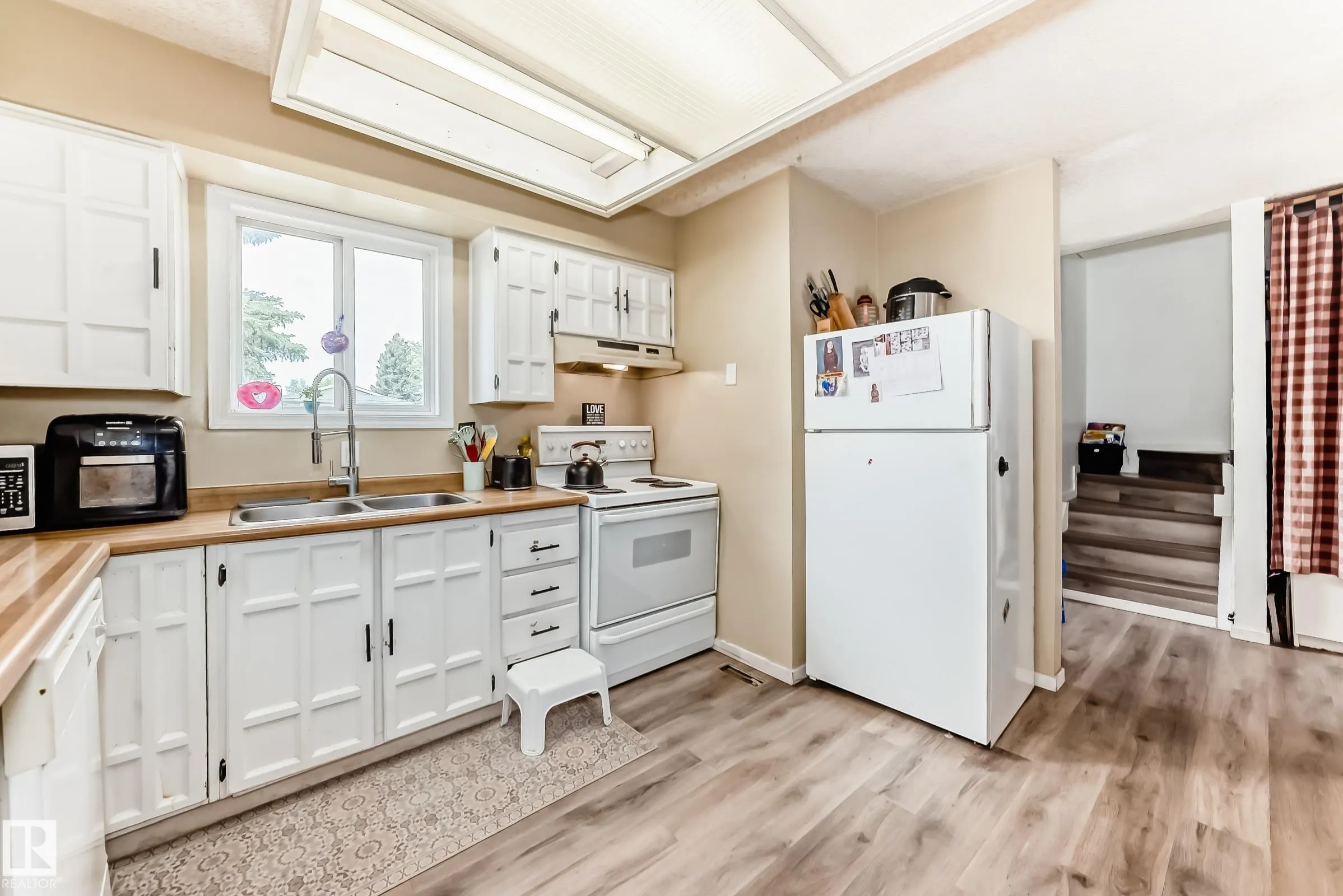 9323 Morinville Drive