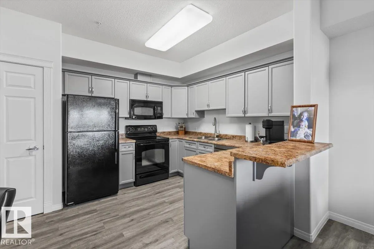 208 8702 Southfort Drive