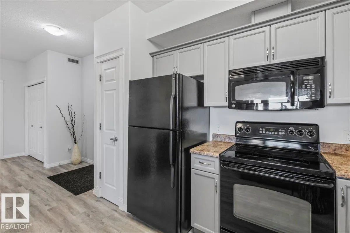 208 8702 Southfort Drive