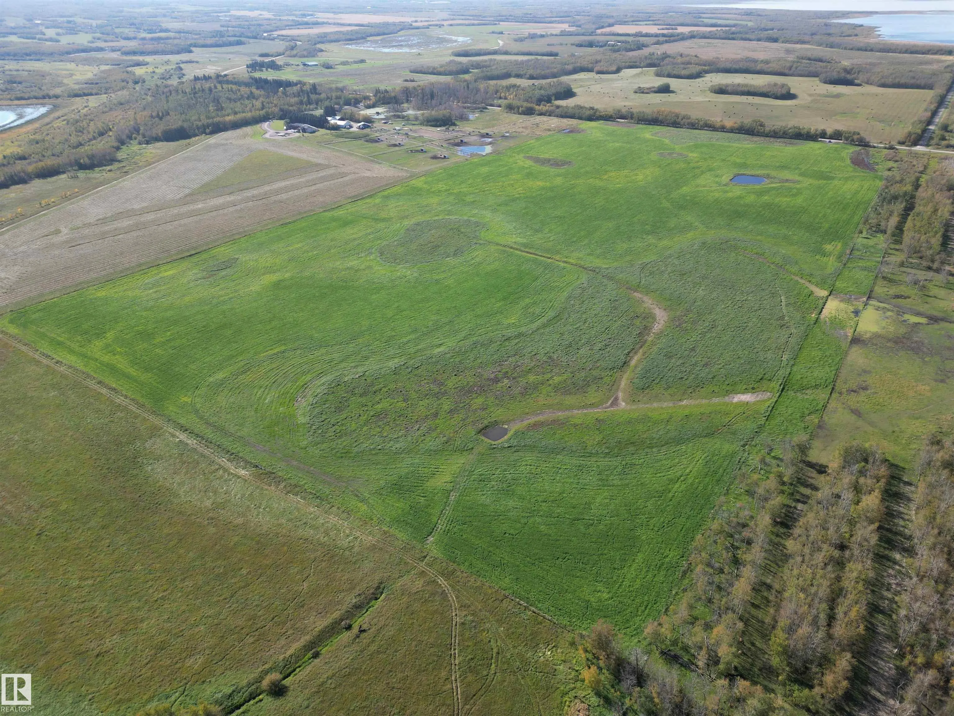 SE CORNER TWP RD 514 & RR 210