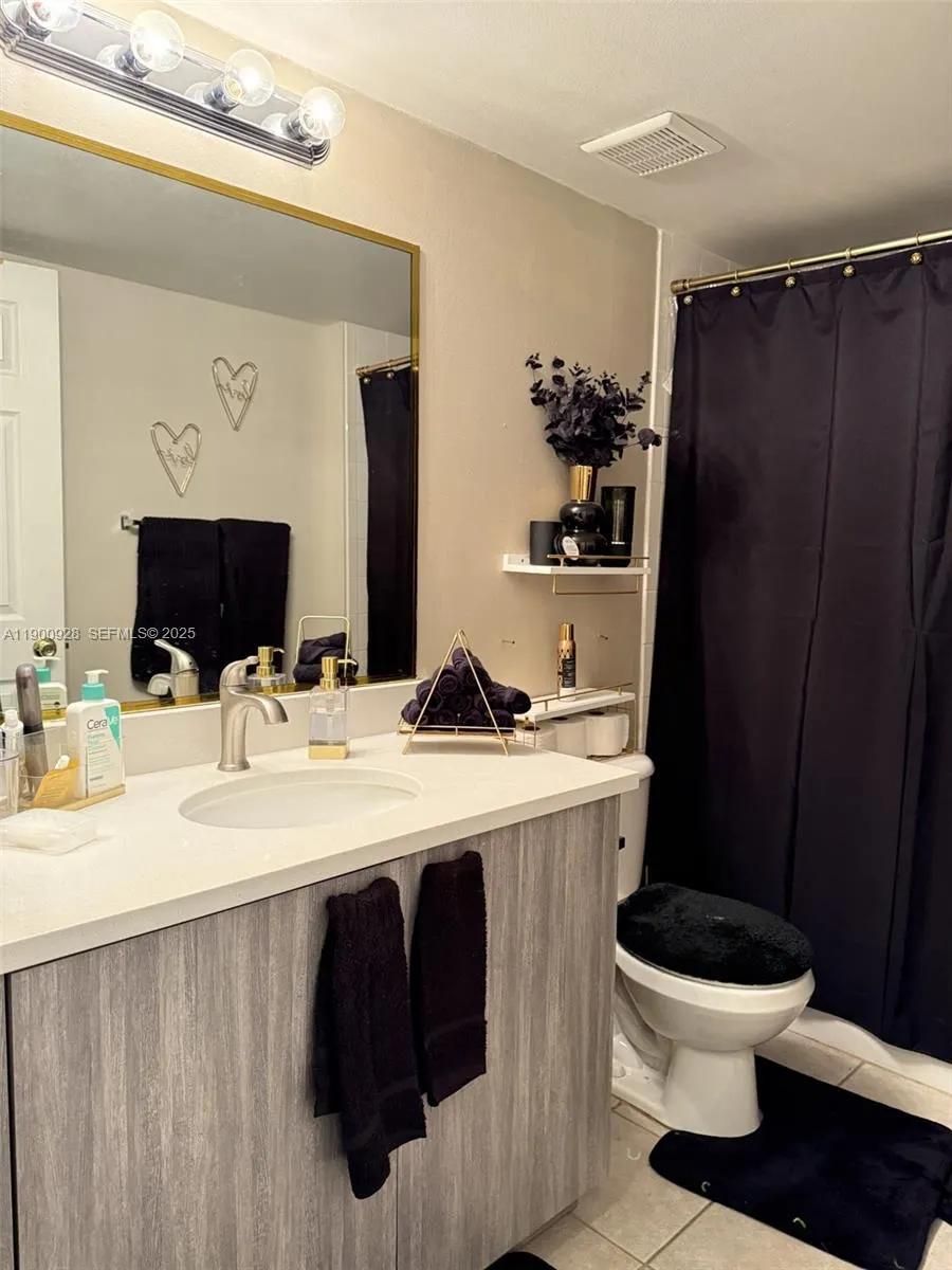 5015 Wiles Road #207