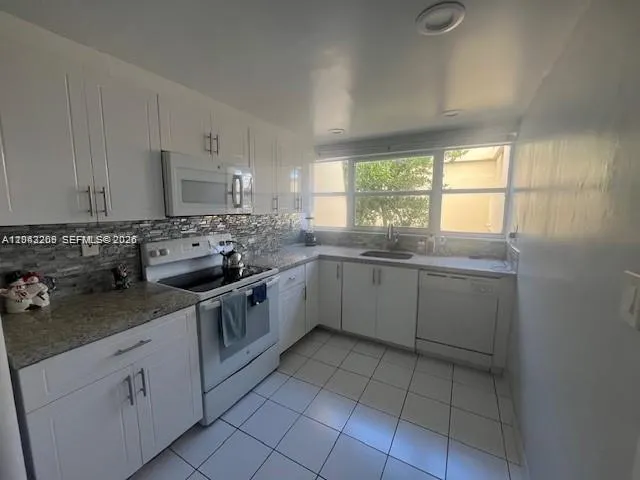 920 NE 199th Street #4S