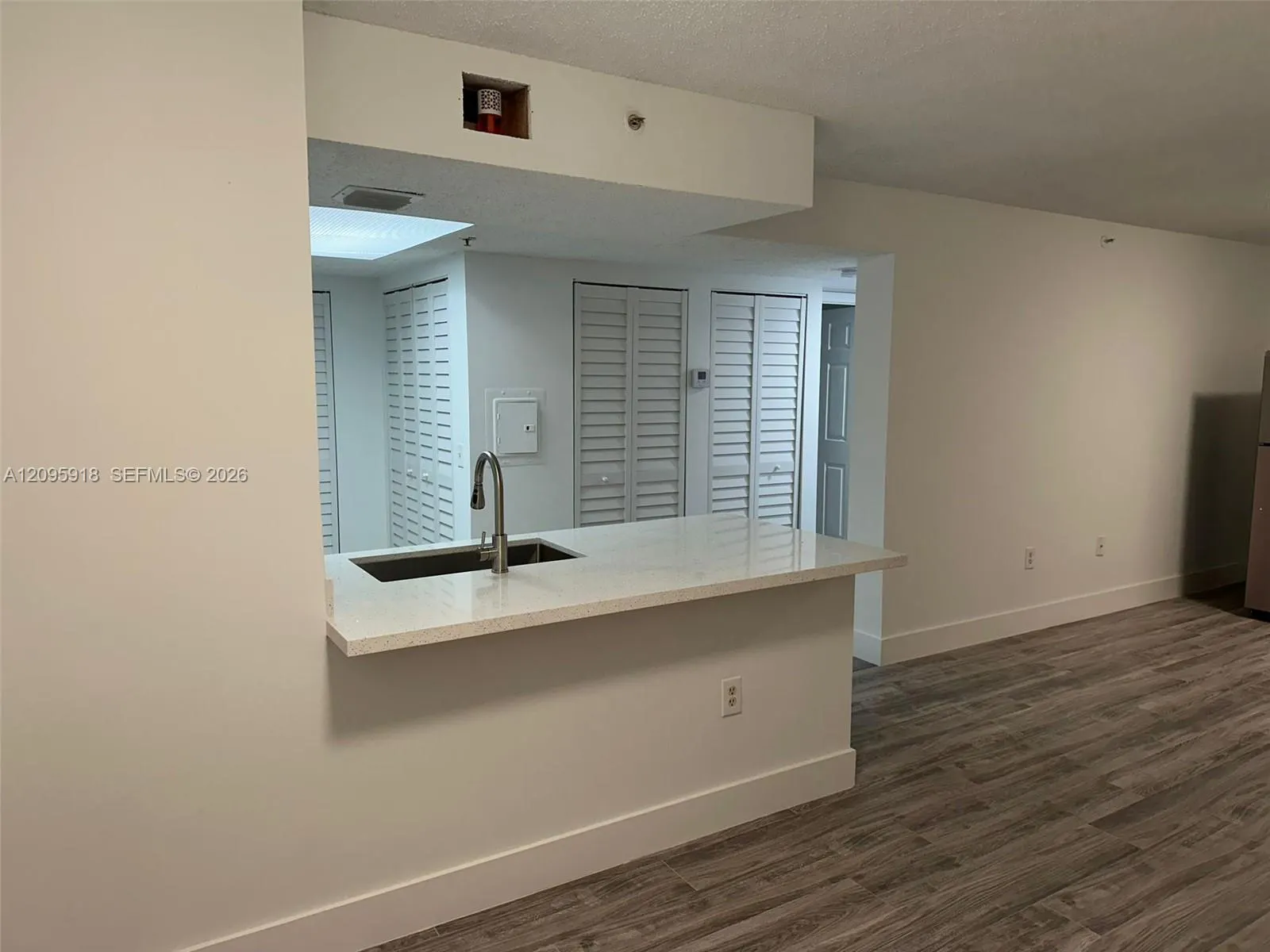 5001 Wiles Road #207