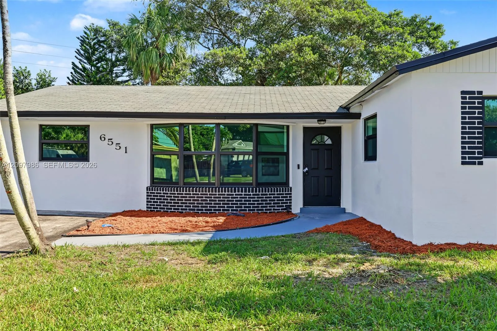 6551 NW 8th Court