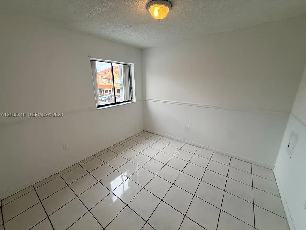2745 W 61st Place #204