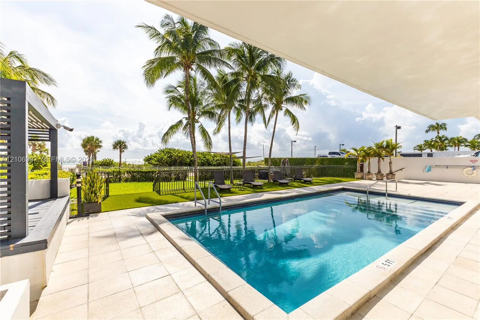 5845 Collins Avenue #405/406