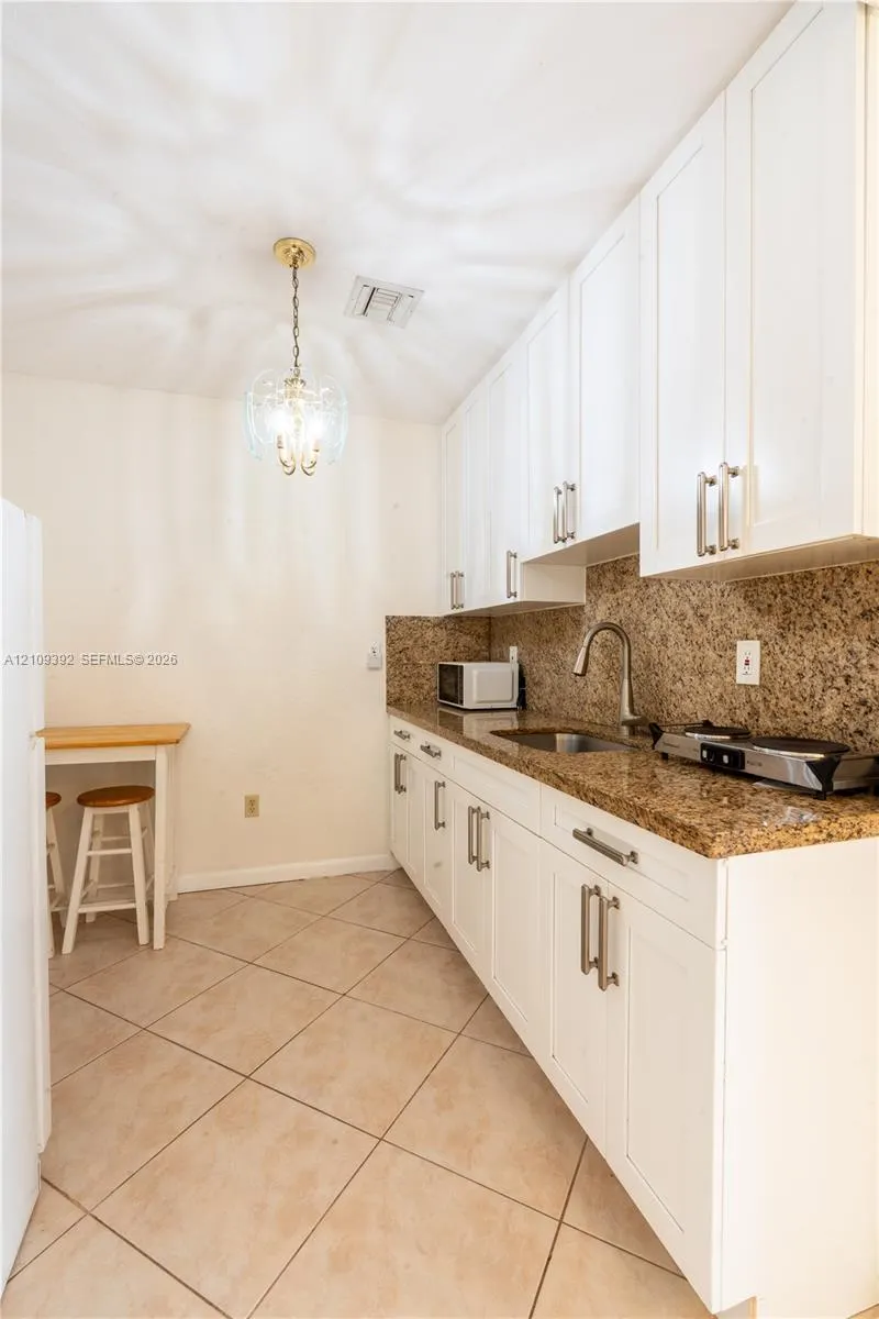 7641 Raleigh Street #1