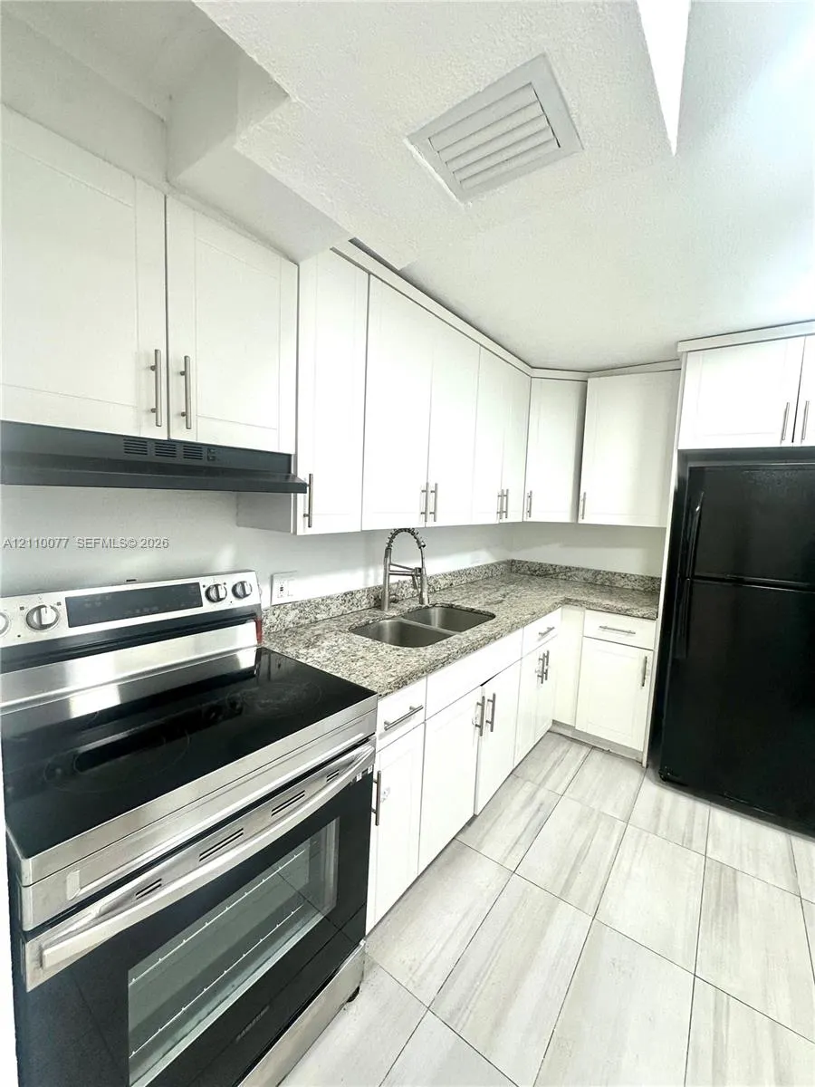 447 NE 195th Street #214
