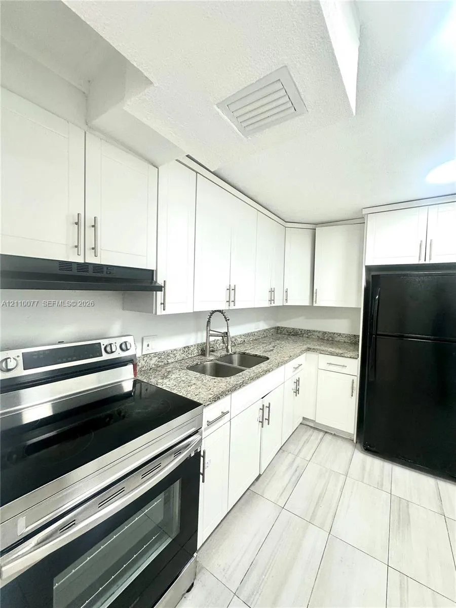 447 NE 195th Street #214