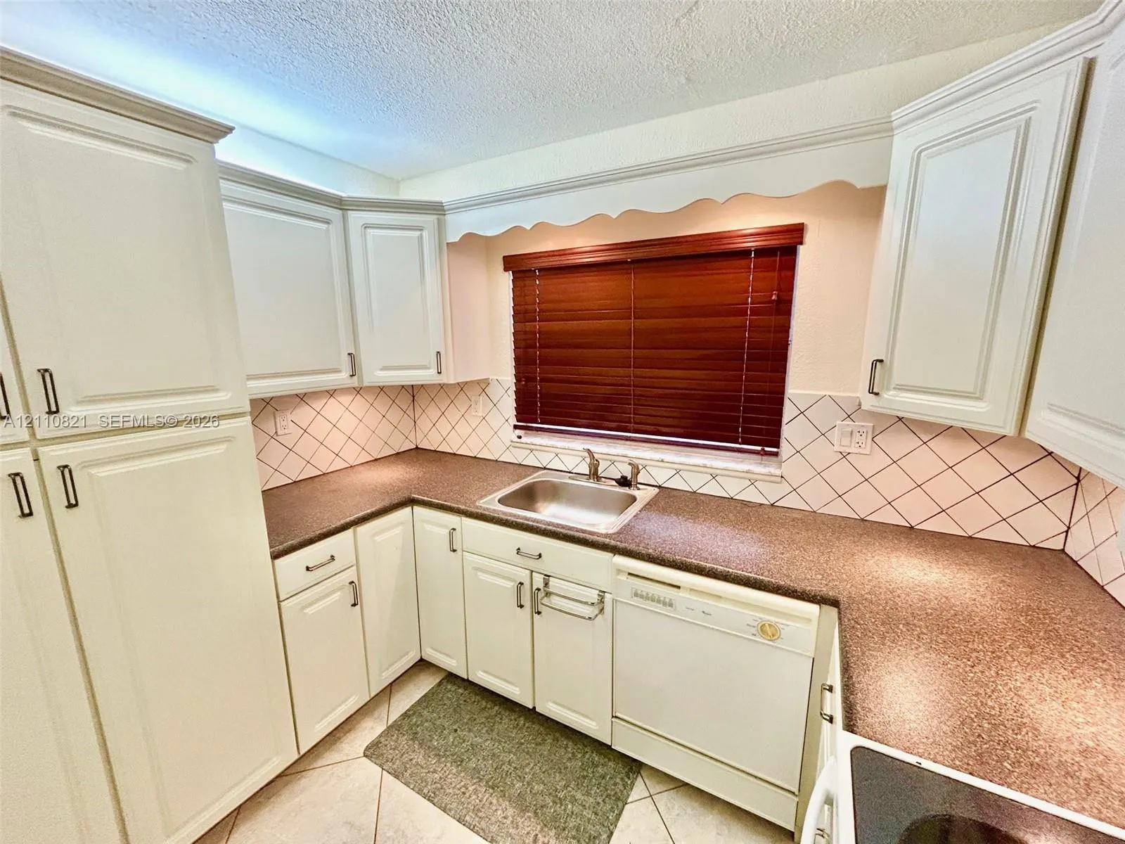 9020 Sunrise Lakes Boulevard #303