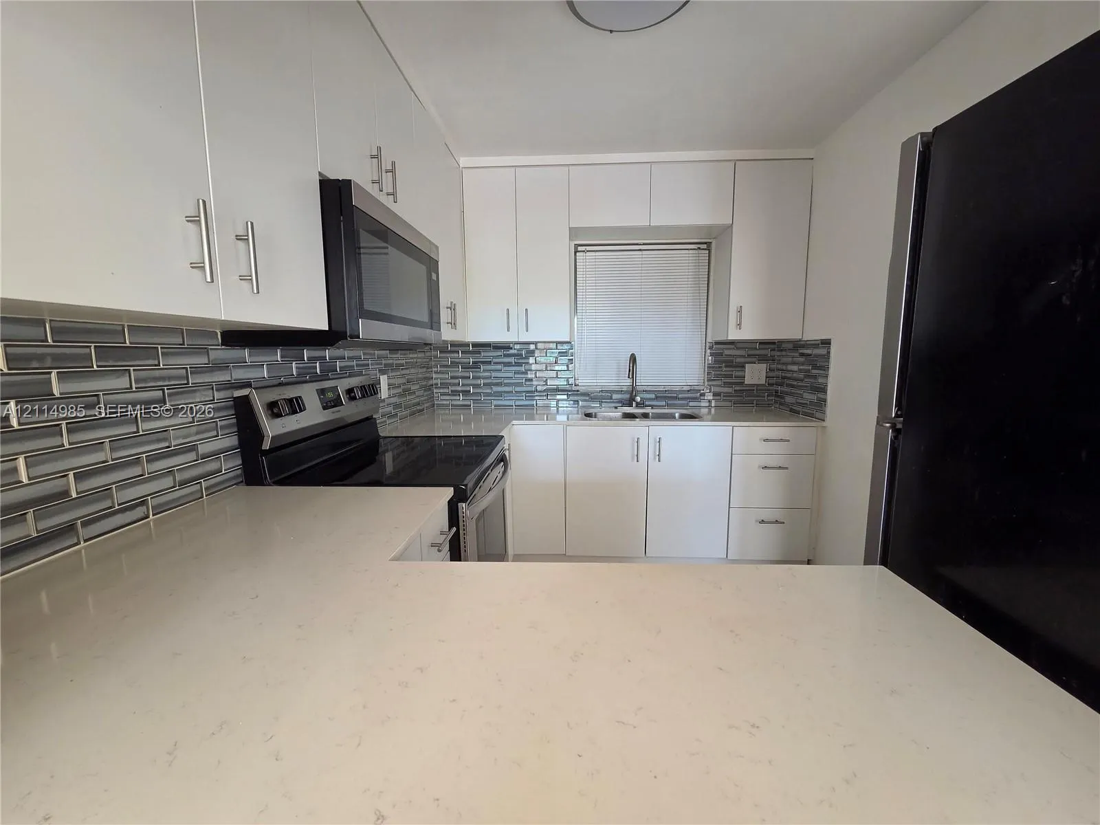 9441 Live Oak Place #308