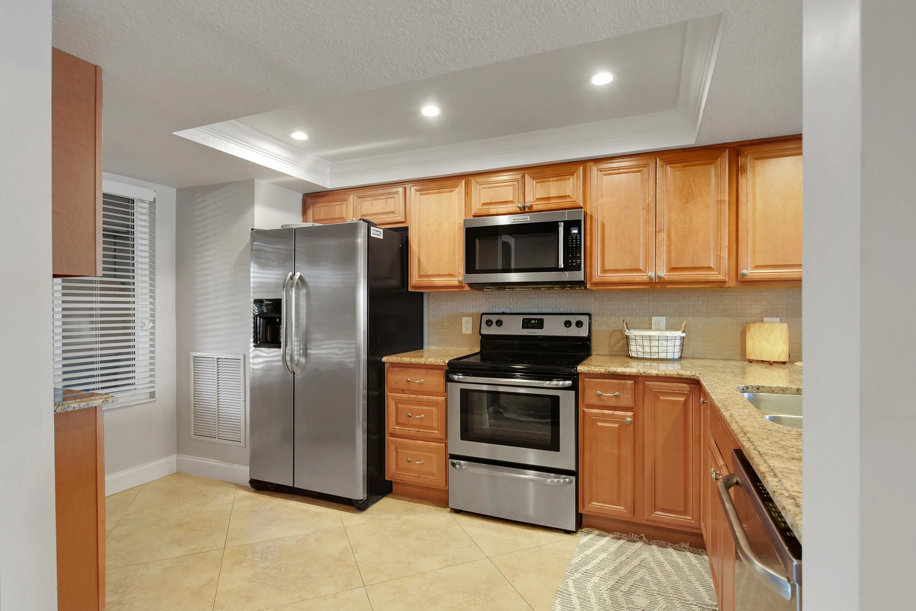 4440 NE Sandpebble Trace #104