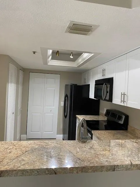 5061 Wiles Road #205