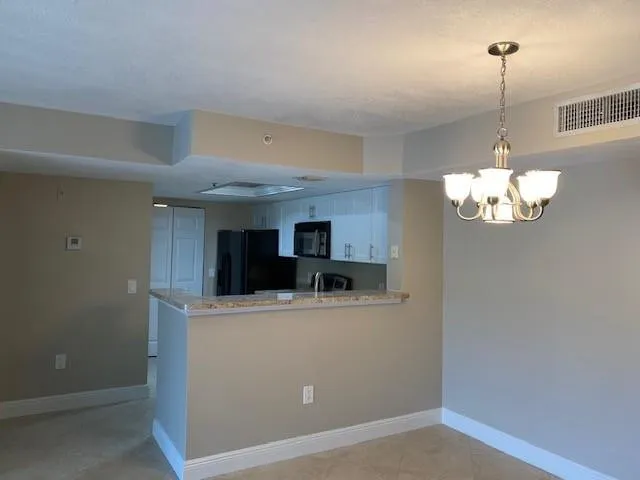 5061 Wiles Road #205