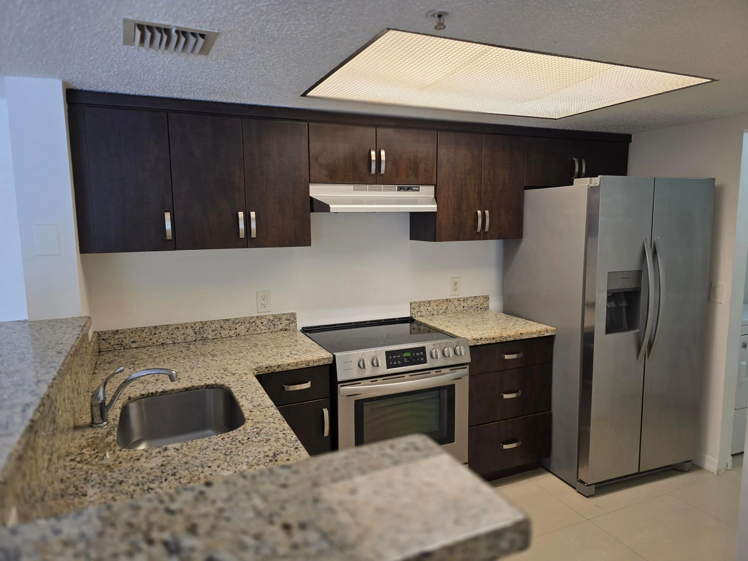 5055 WILES Road #207