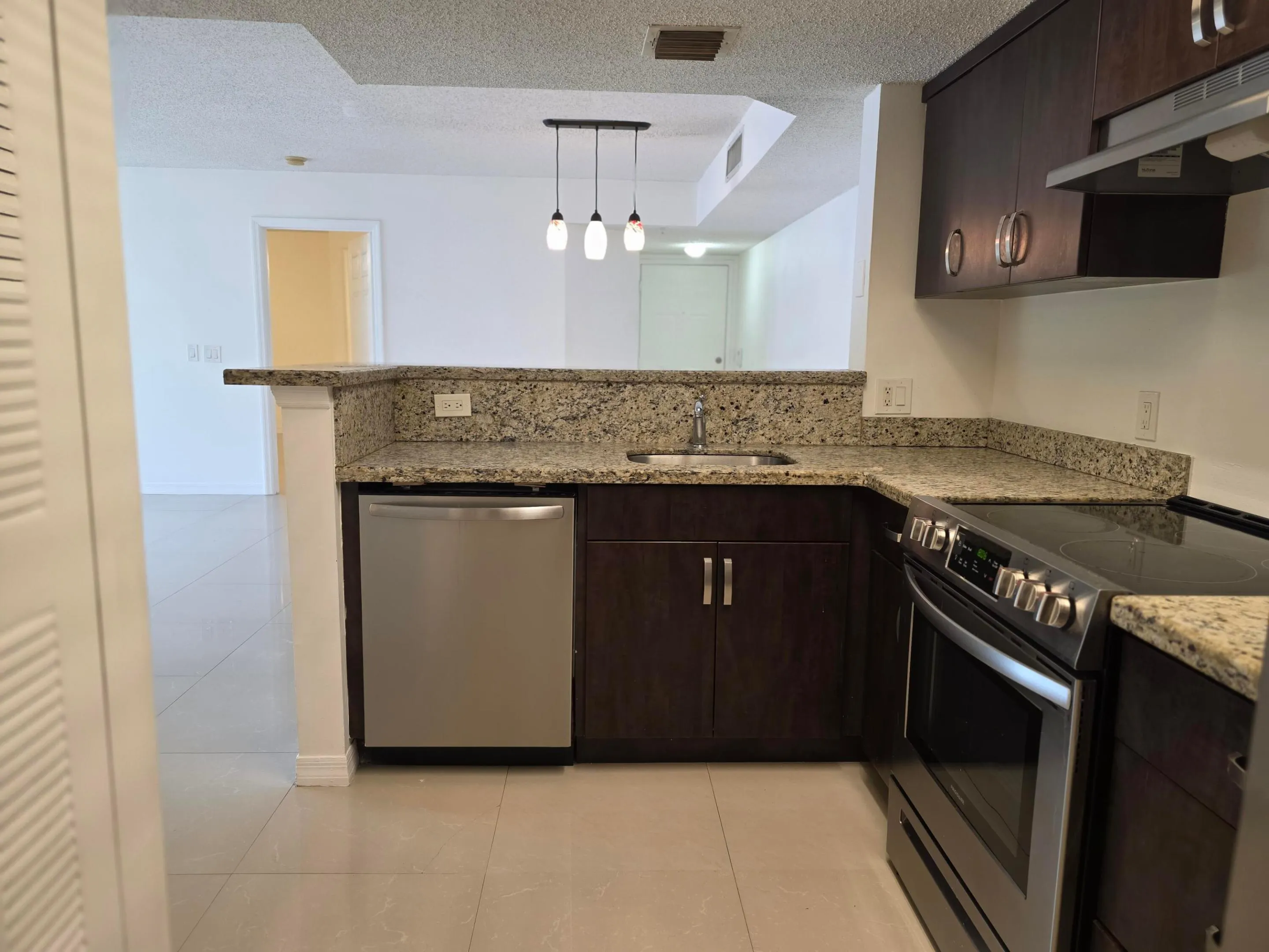 5055 WILES Road #207