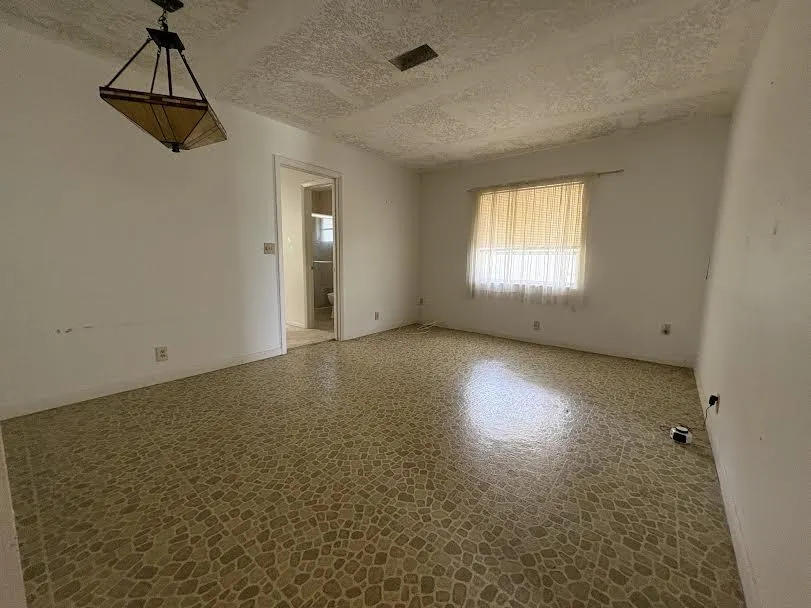 1410 NW 48TH Place