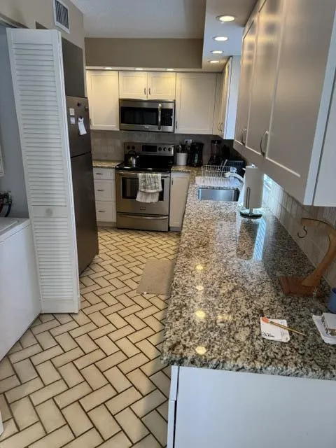 5780 PRINCESS PALM Court #C