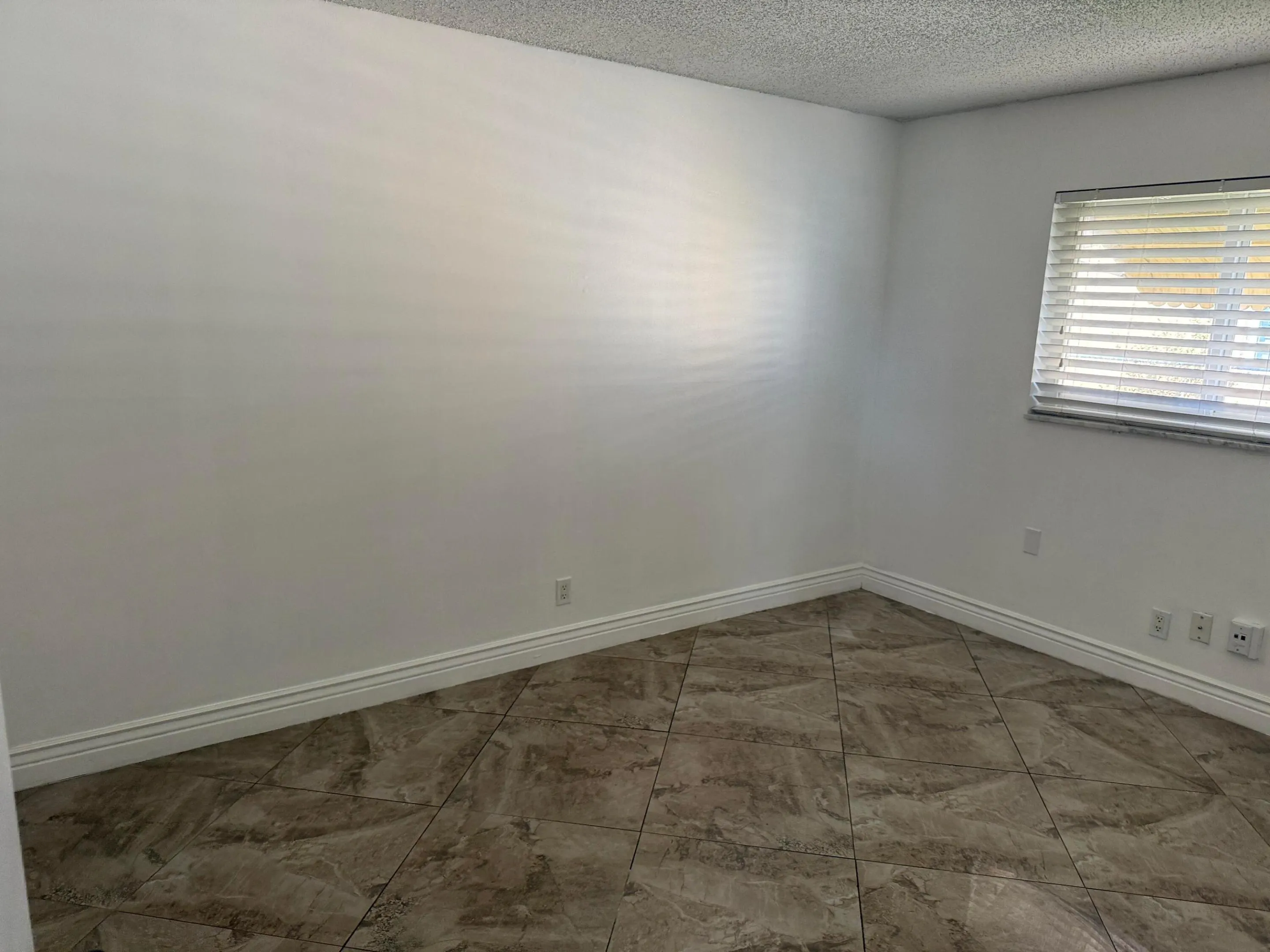 6957 NW 9TH Court