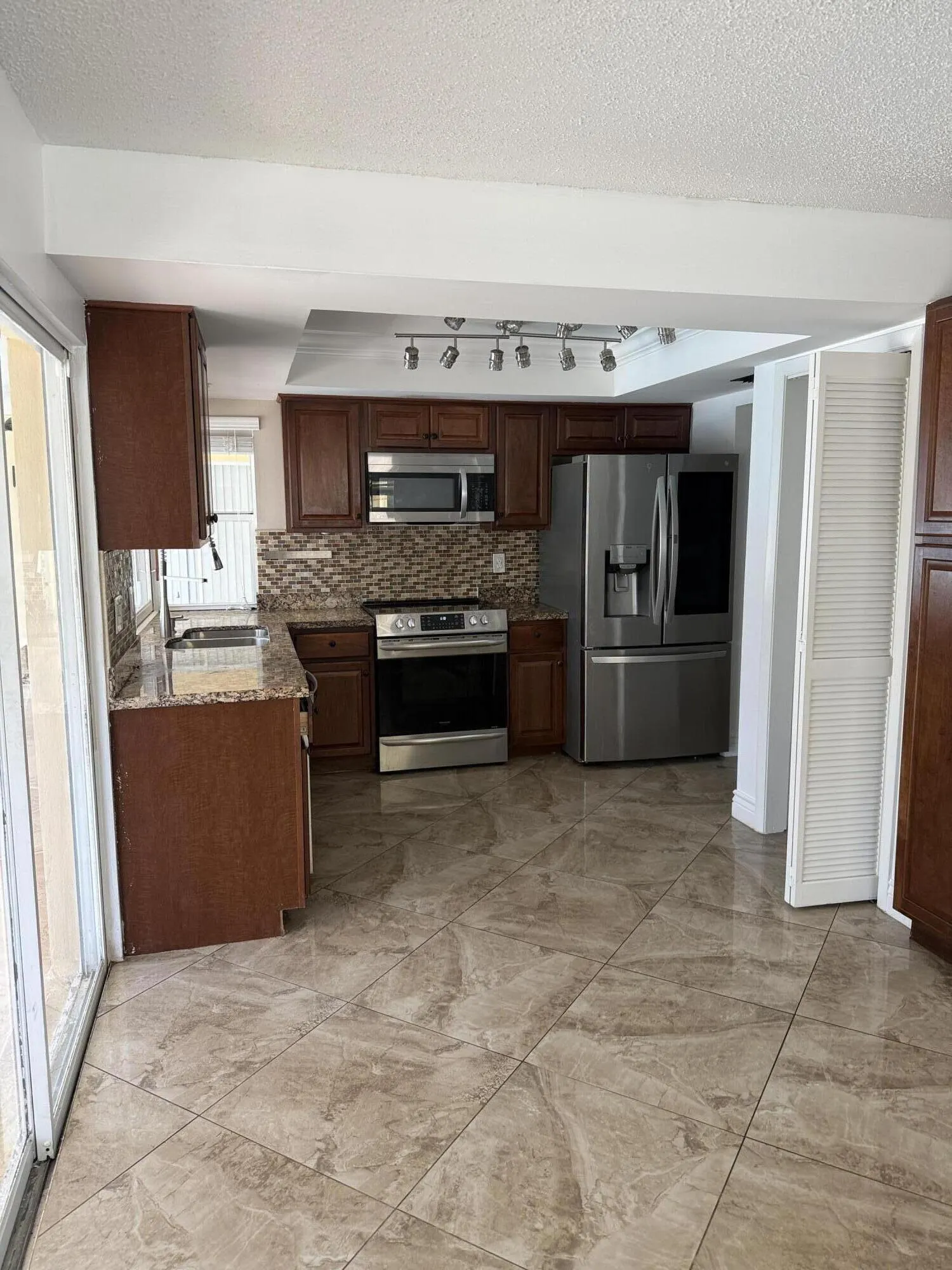 6957 NW 9TH Court