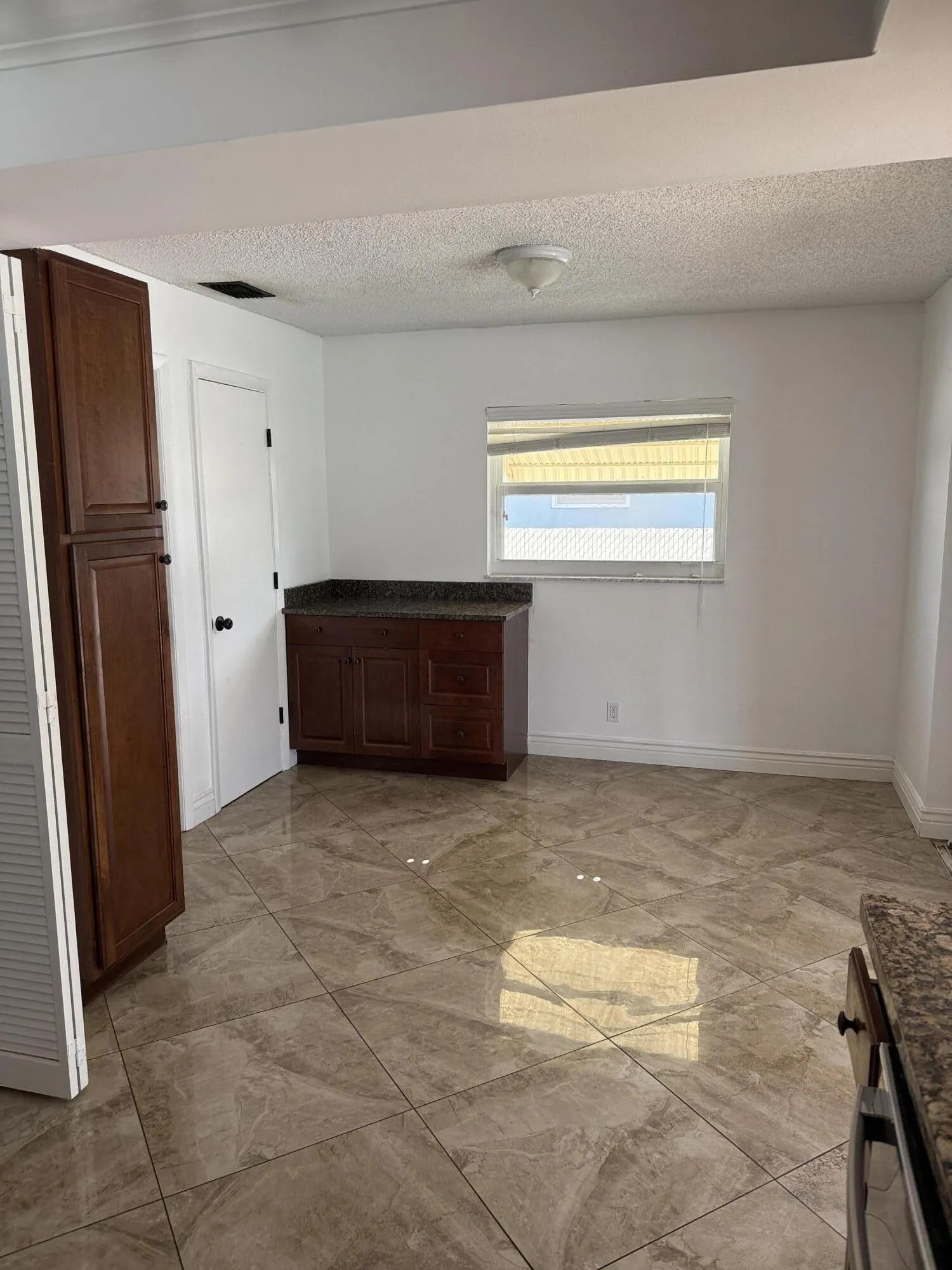 6957 NW 9TH Court
