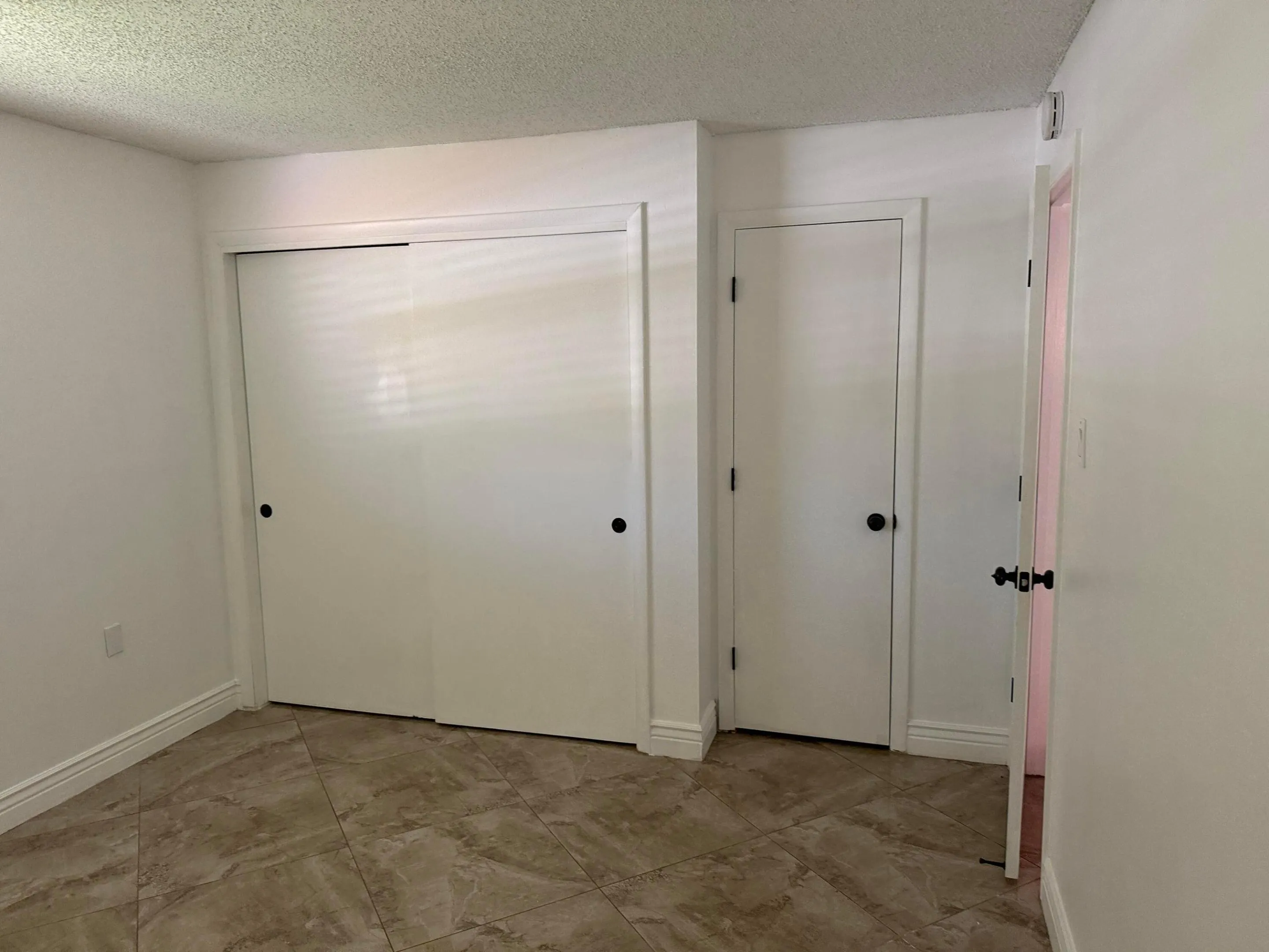 6957 NW 9TH Court
