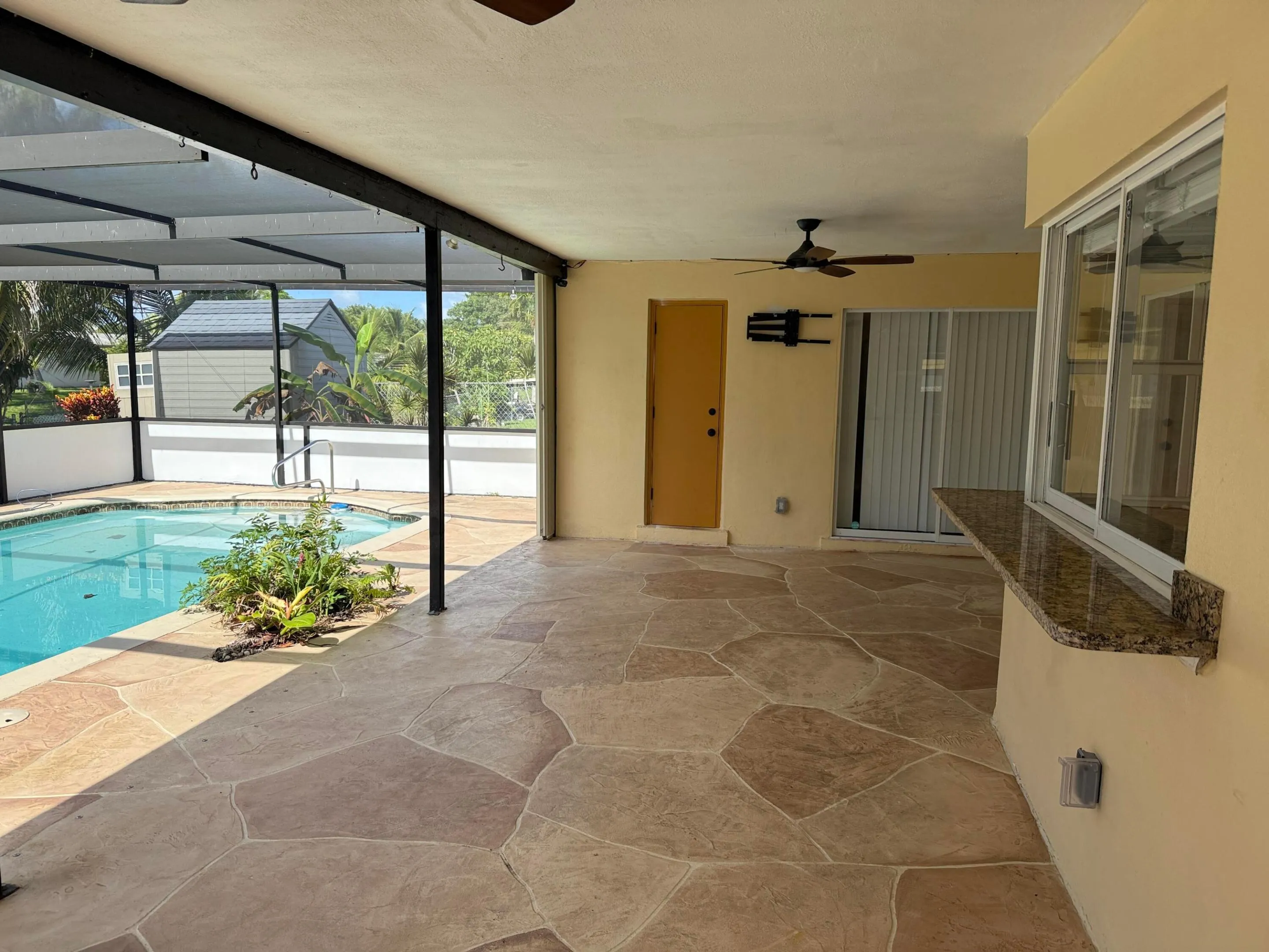 6957 NW 9TH Court