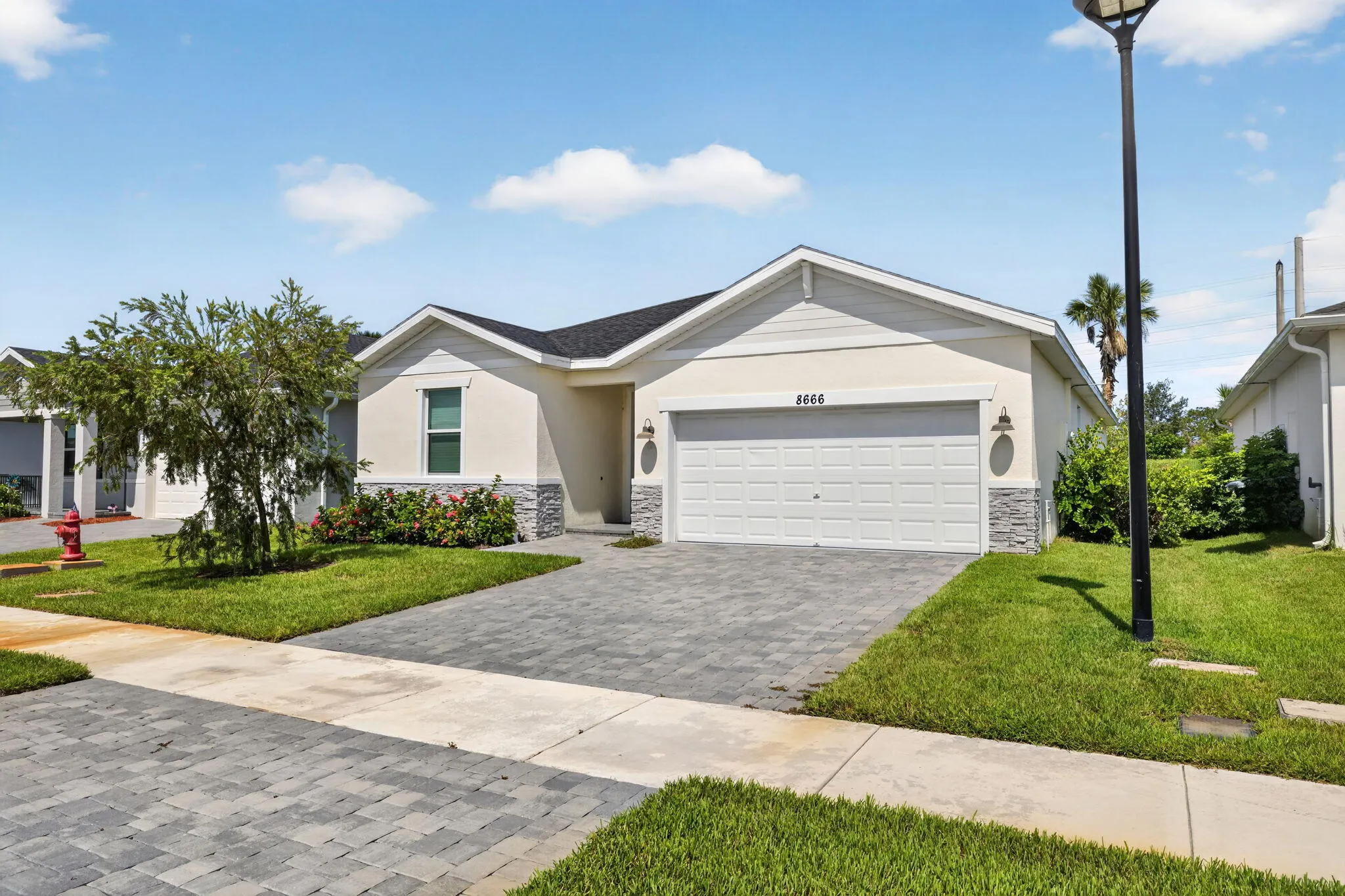 8666 DAHLIA Circle