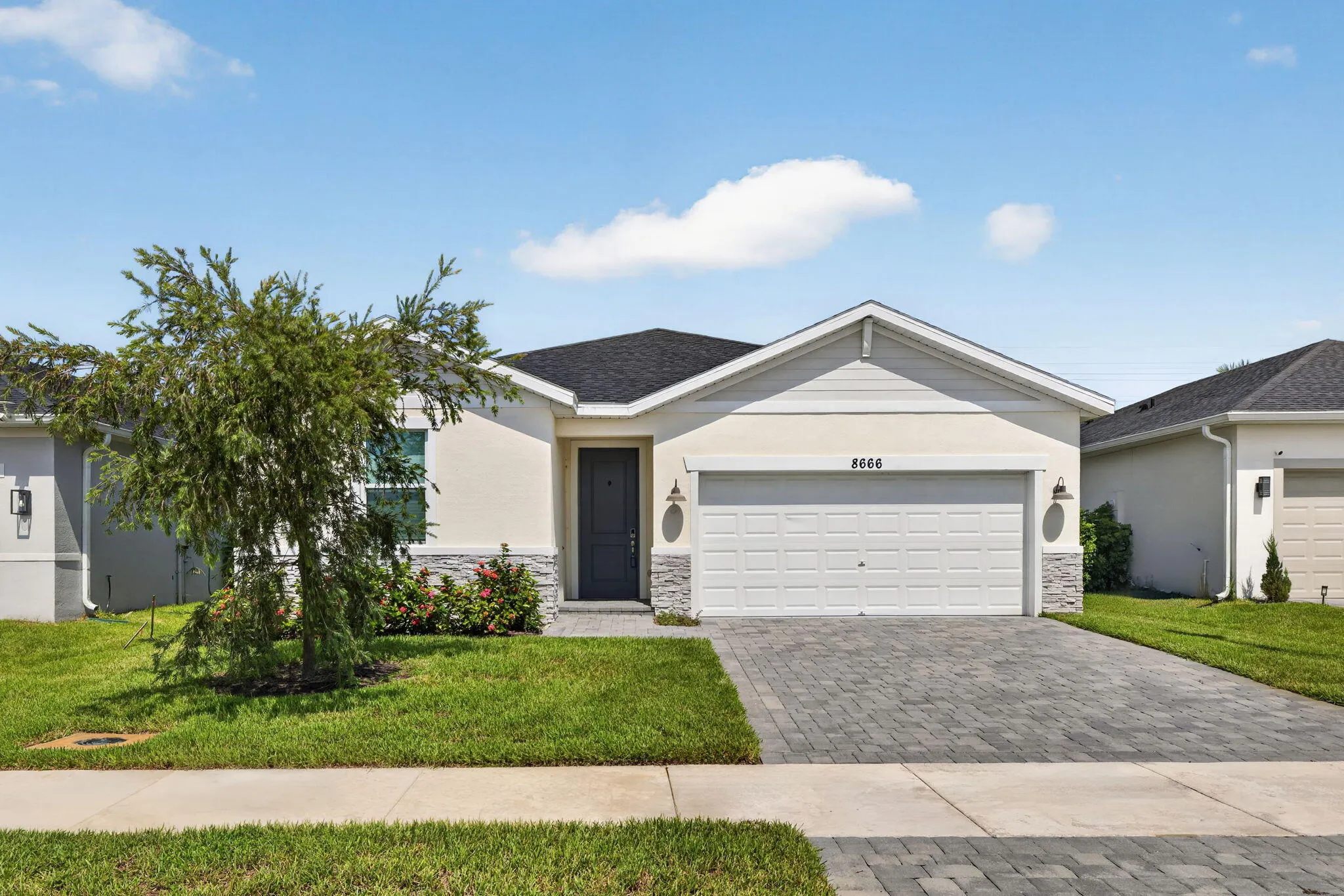 8666 DAHLIA Circle