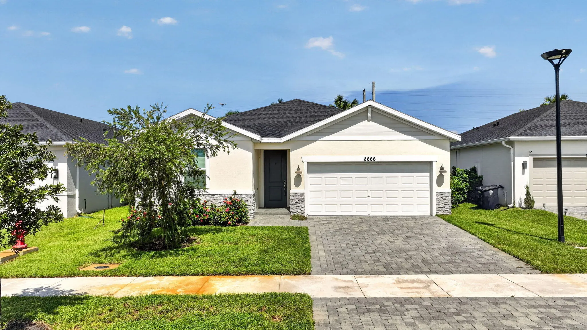 8666 DAHLIA Circle