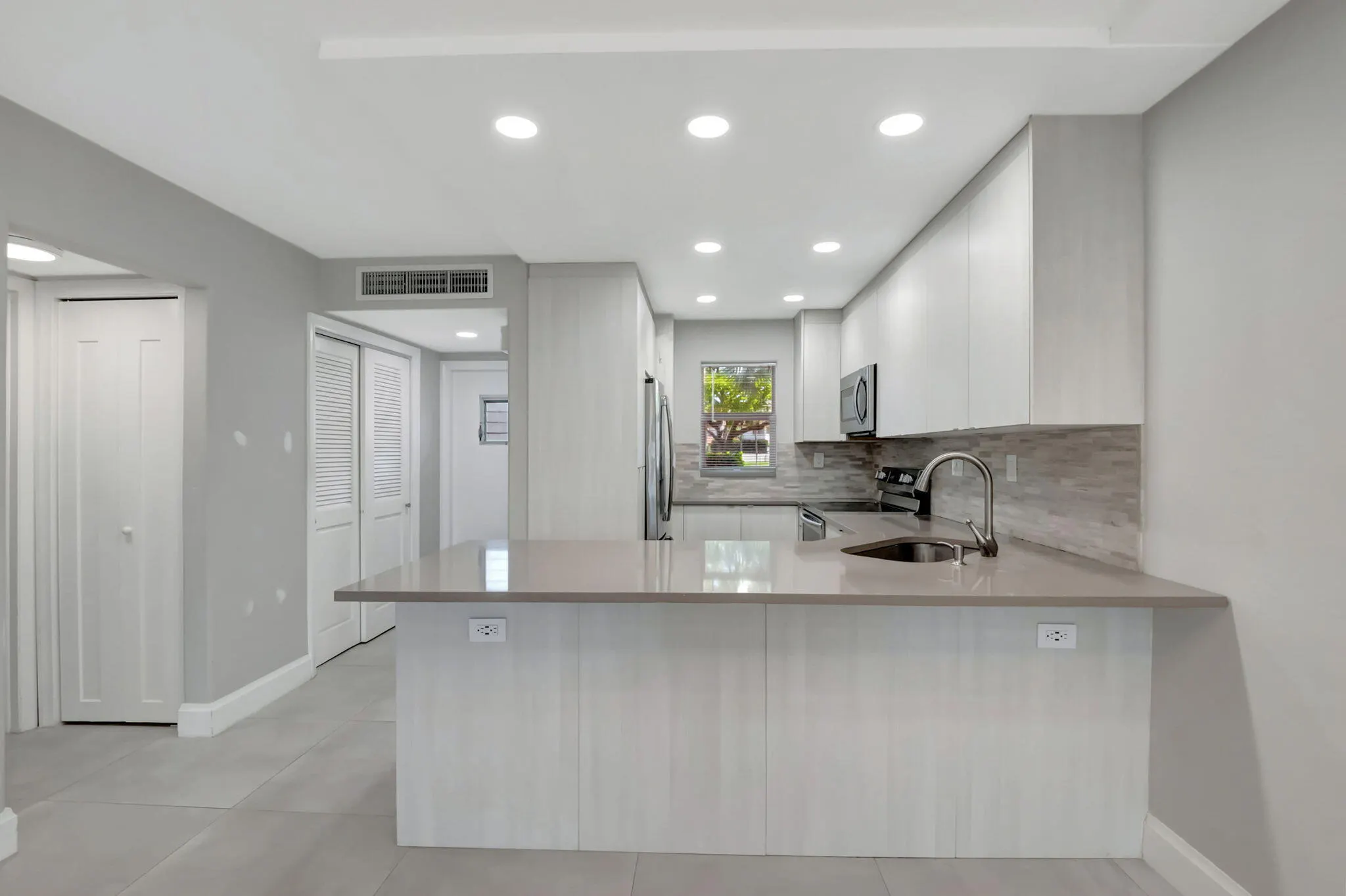 750 NE Spanish River Boulevard #103