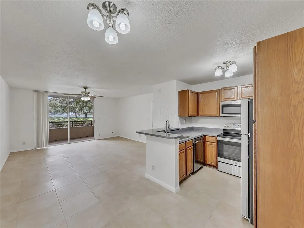 611 Lyons Rd, #8102