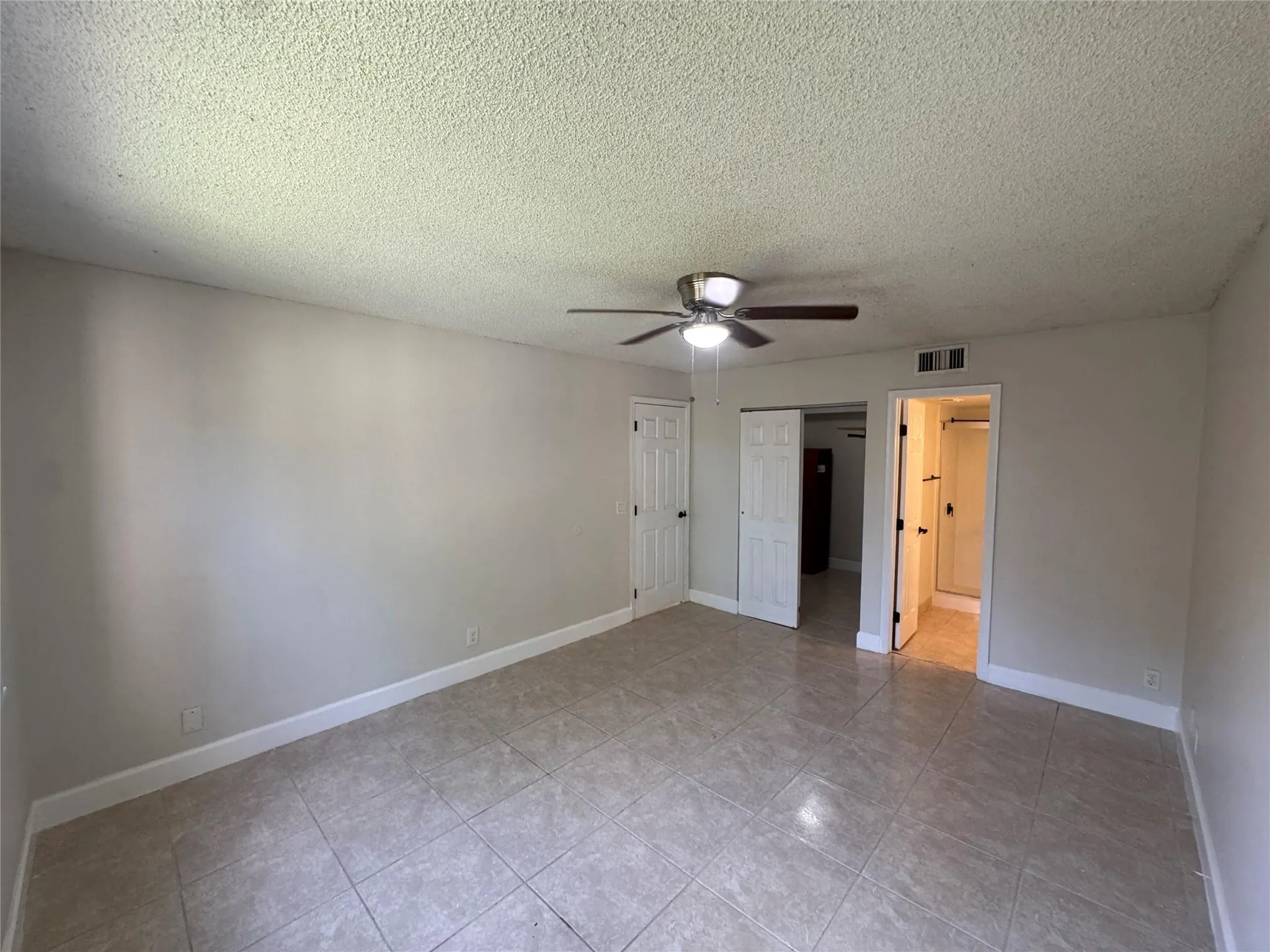 9033 Wiles Rd, #208