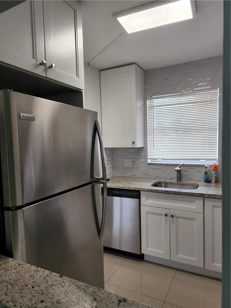 9911 Sandalfoot Blvd, #101