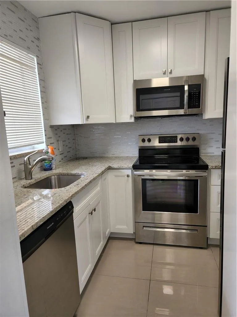 9911 Sandalfoot Blvd, #101