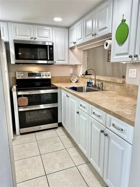 9201 Lime Bay Blvd, #214