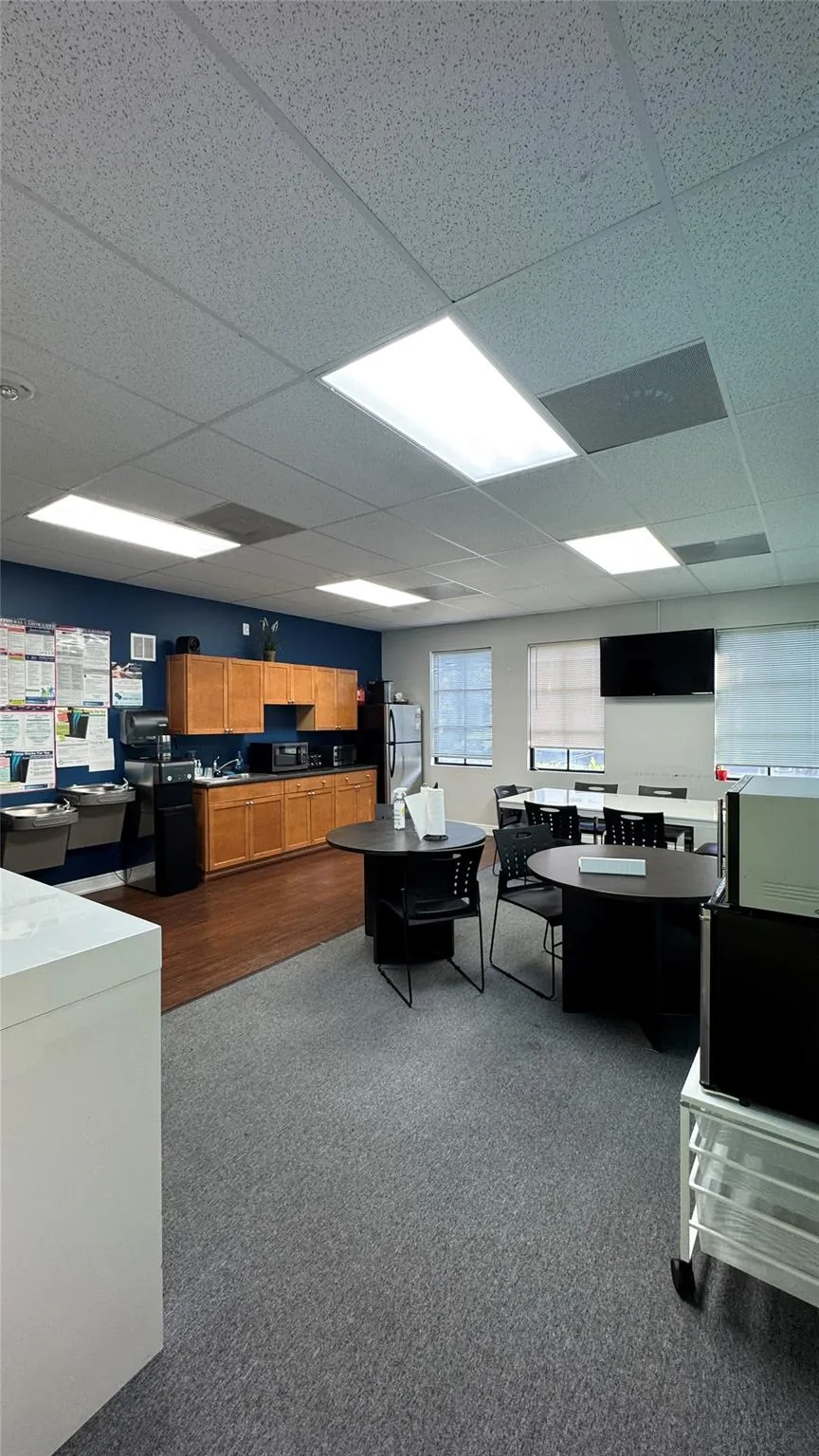 7451 Wiles Rd, #104&105