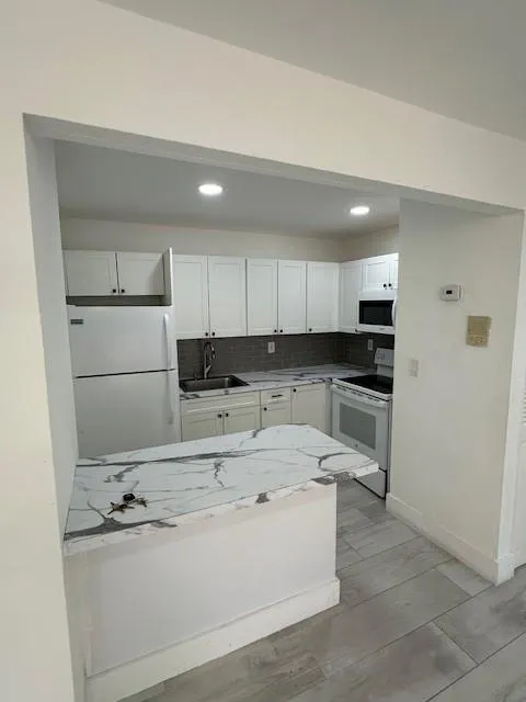 4265 NW South Tamiami Canal Dr, #1-104