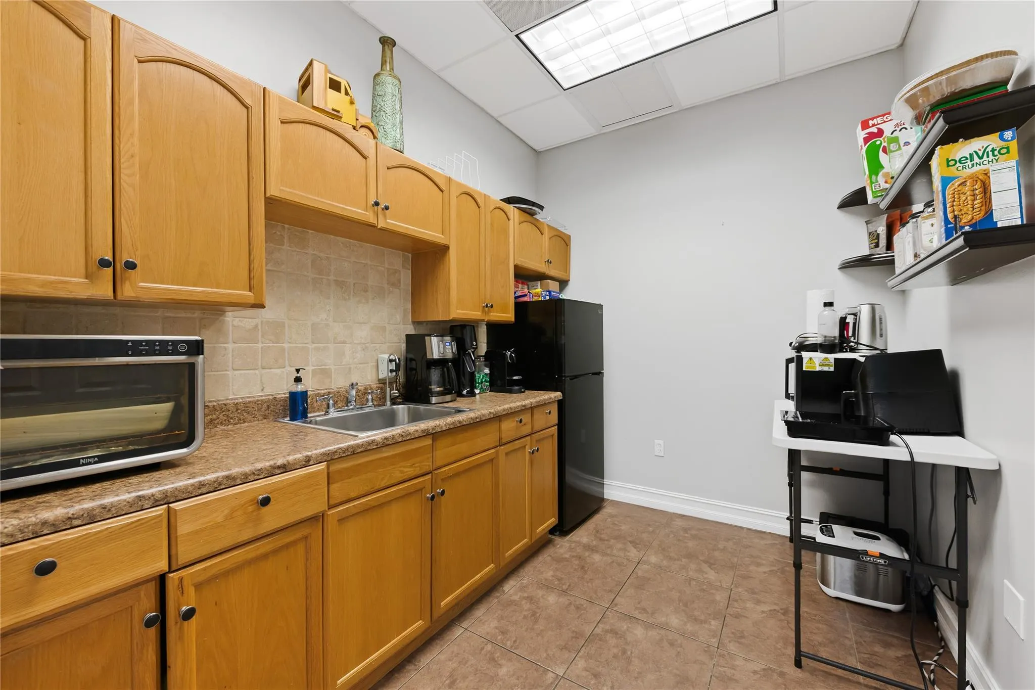 5497 Wiles Rd, #205