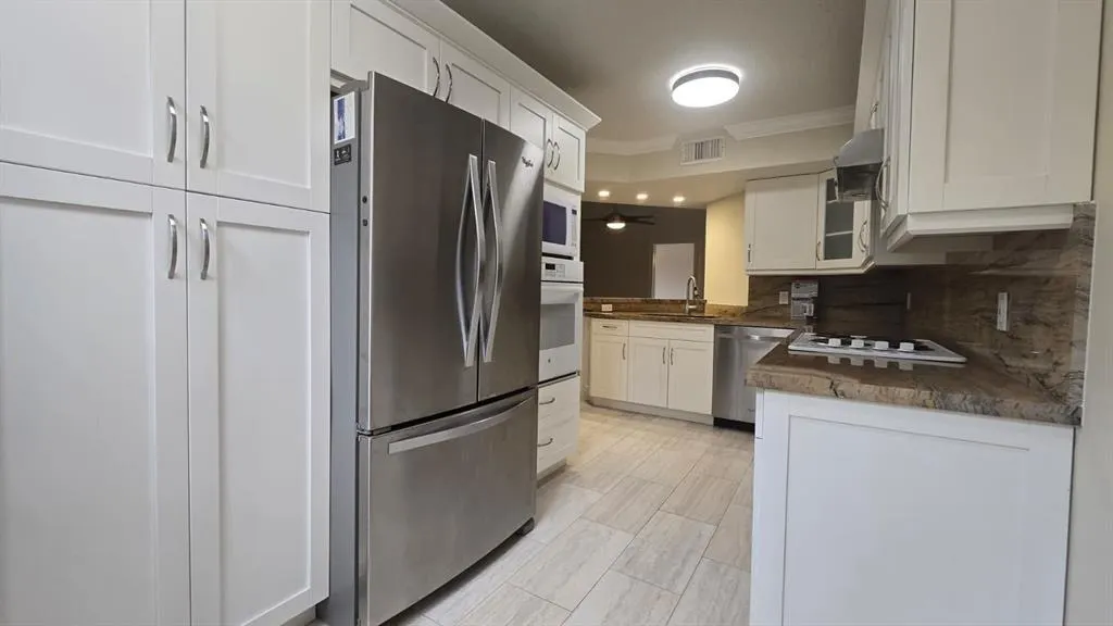 8871 WILES ROAD, #202