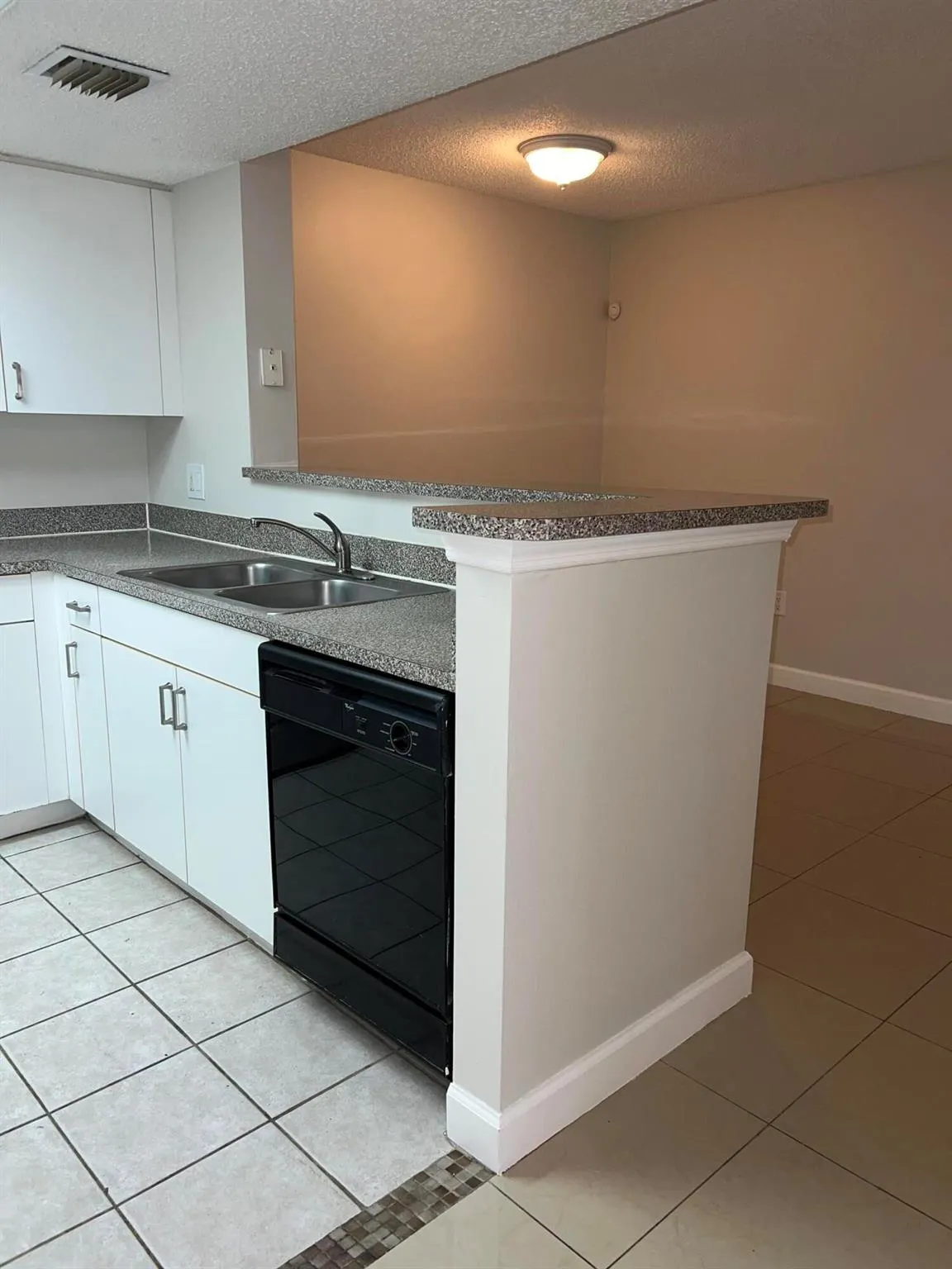 5001 Wiles Road, #204