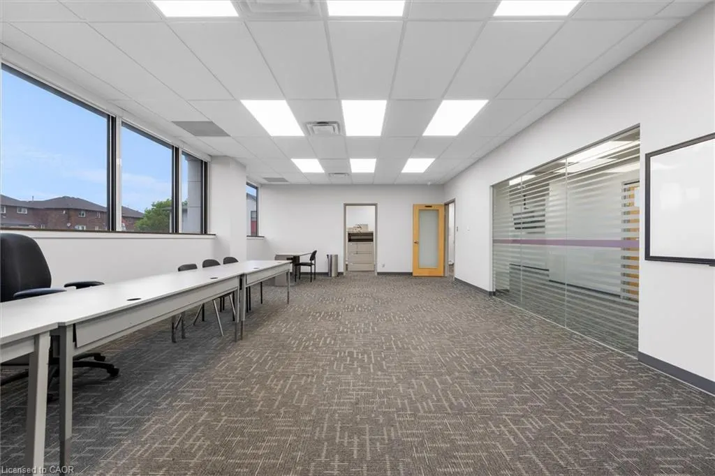 163 Centennial Parkway N, #100