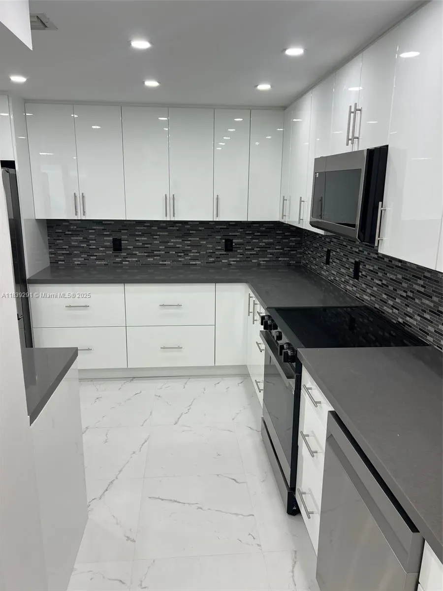 9801 Collins Ave, #15X/complete renovated
