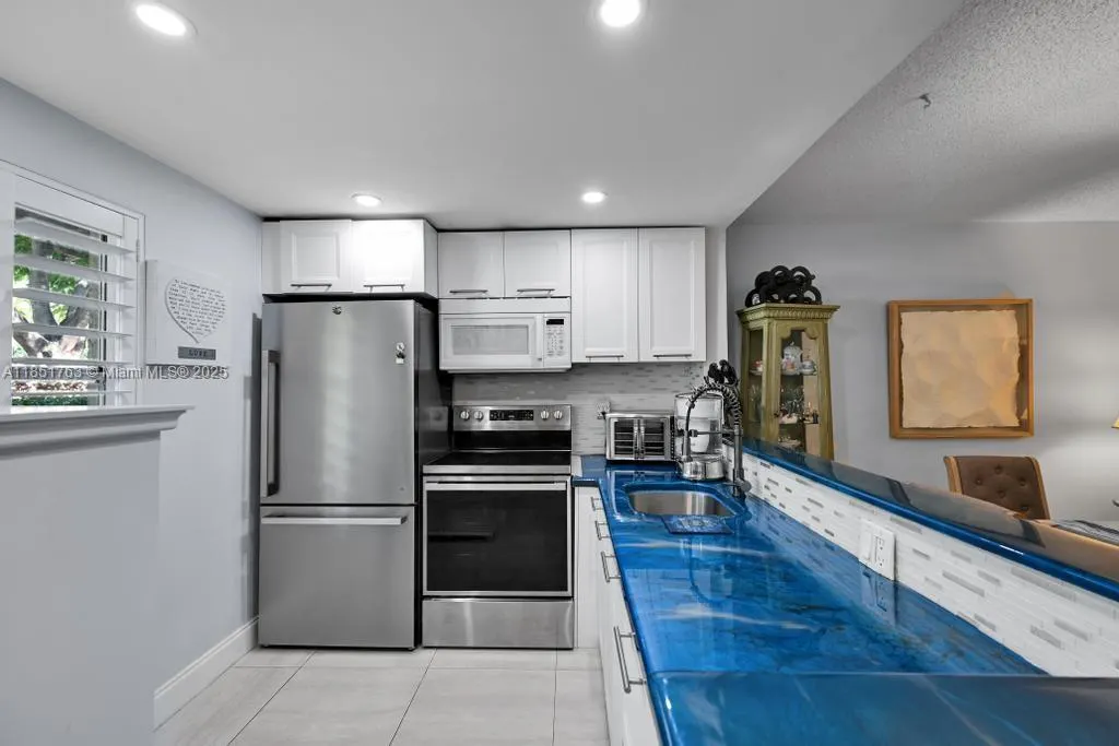 9300 Lime Bay Blvd, #103