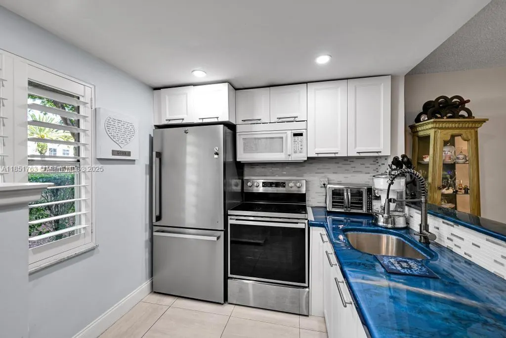 9300 Lime Bay Blvd, #103
