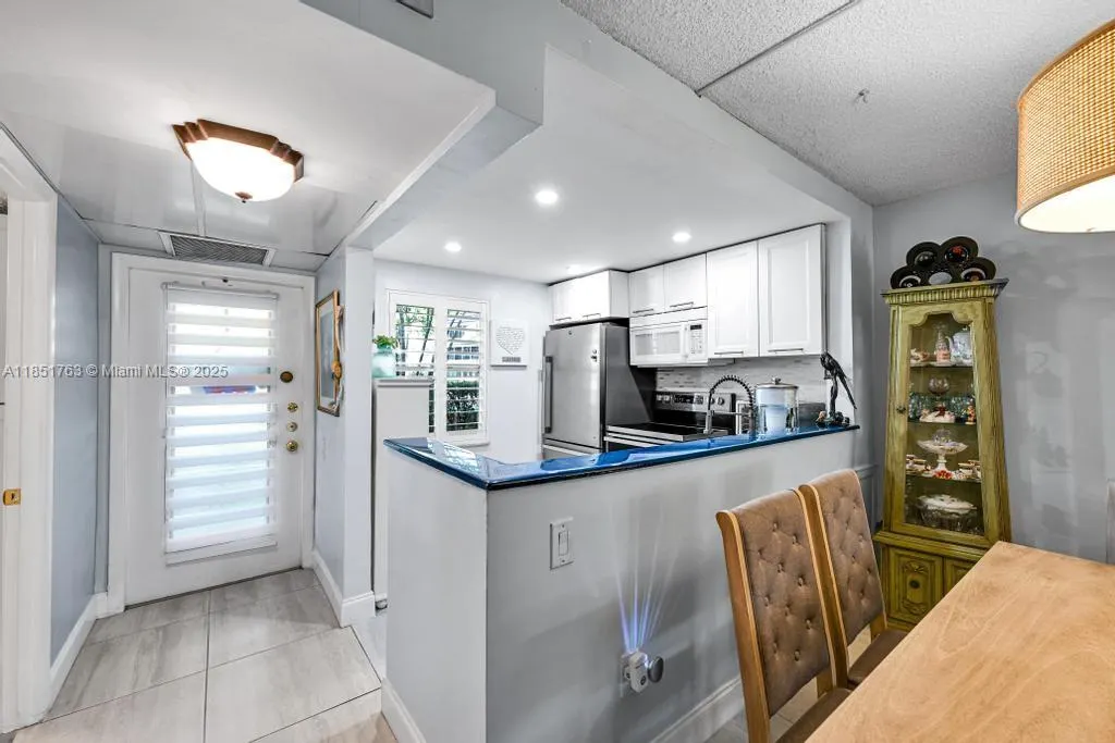 9300 Lime Bay Blvd, #103