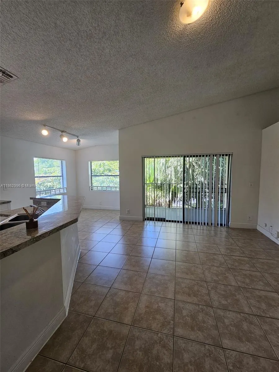 9999 Summerbreeze Dr, #215